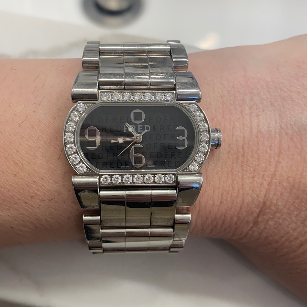 Authentic stainless steel and diamond watch